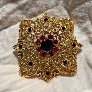 TC Signed Gold-tone Red and Purple Rhinestone Brooch